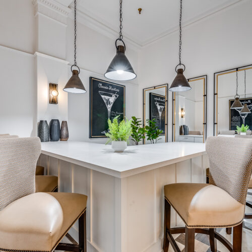 Lounge area with barstools and counter